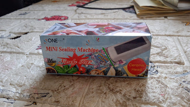 Handheld mini sealer for plastic bags